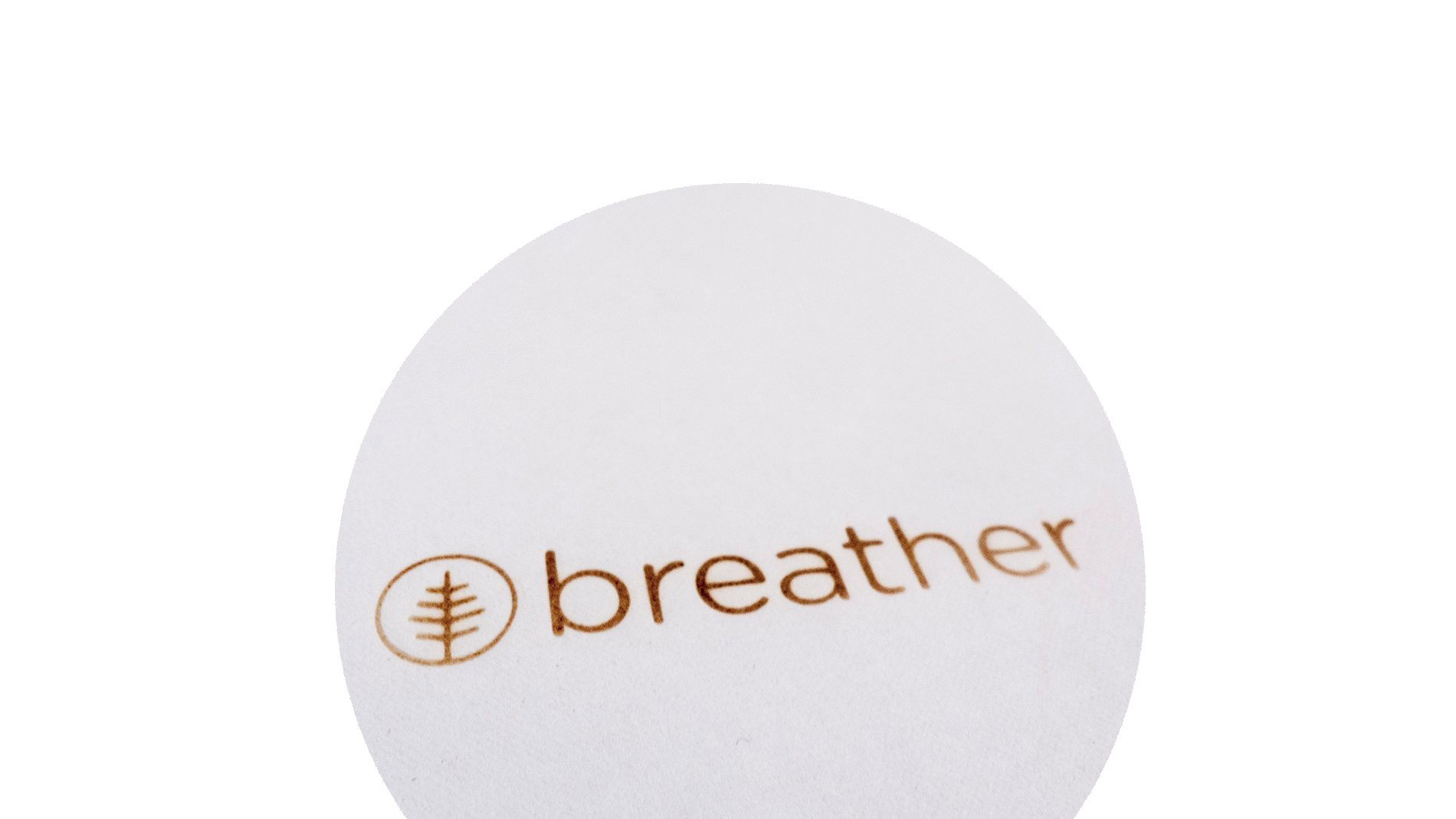 FSC-certified envelope packaging with Breather branding, heat-stamped